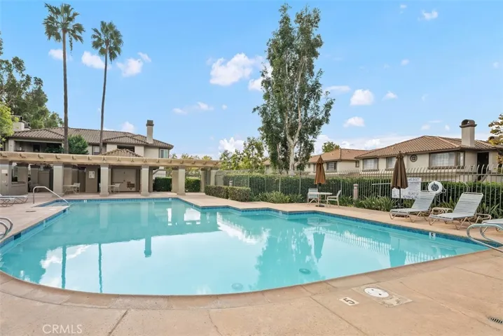 Pool area features showers and restrooms