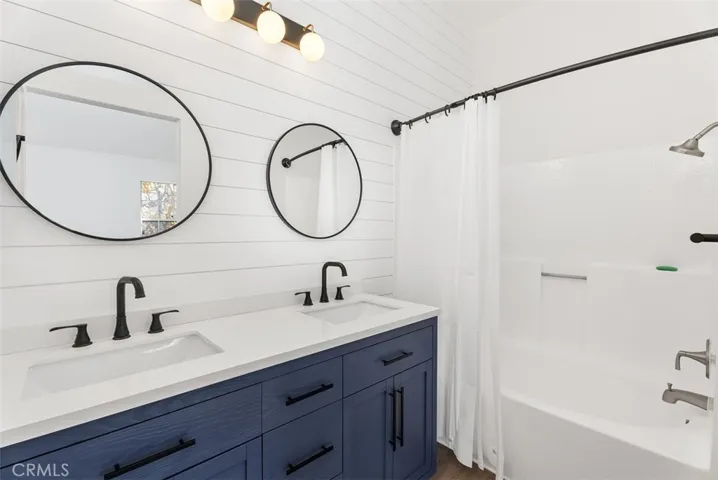 Complete, upgraded master bathroom with dual vanity