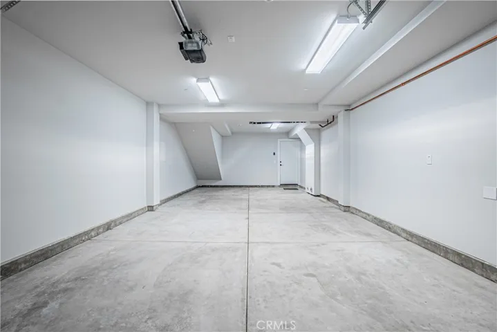 Spacious tandem garage.