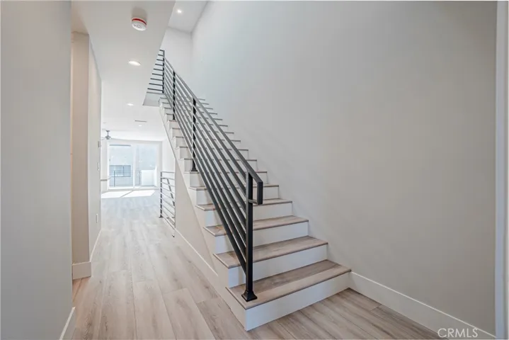 View of 3rd level staircase from main level en-suite.
