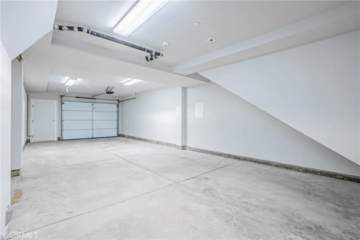 Spacious tandem garage.