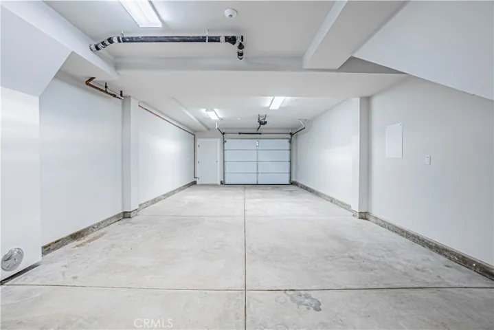 Spacious tandem garage.