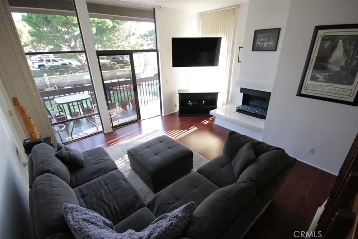 Living room with floor to ceiling windows and private balcony overlooking the marina!