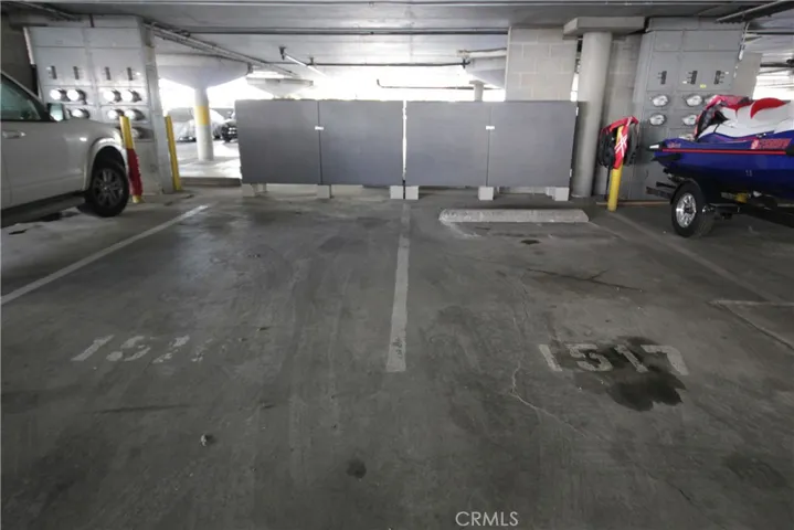Two covered/assigned parking spaces with new storage cabinets!