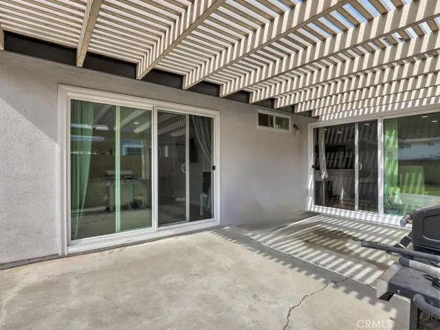 Sliding Glass Doors from the Master Bedroom open to the back patio.