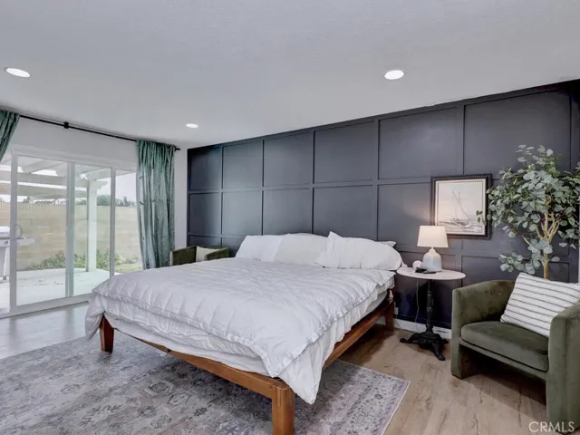 Master Bedroom with sliding glass doors to the back patio.