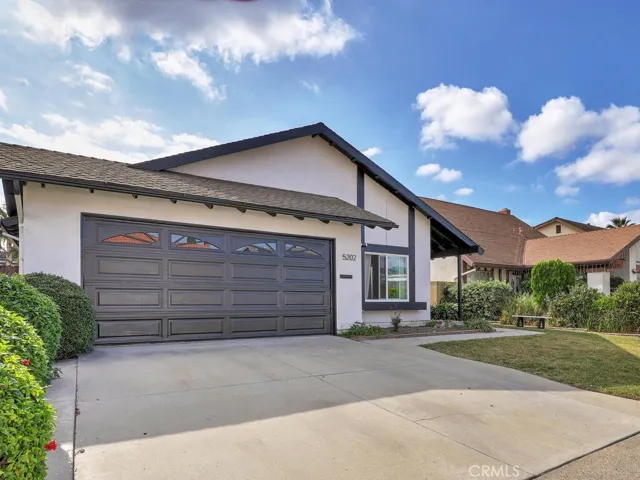 Exterior Front with two-car-garage.