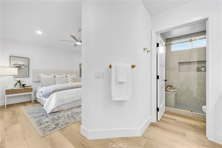 Designer modifications open up bathroom space while remaining private