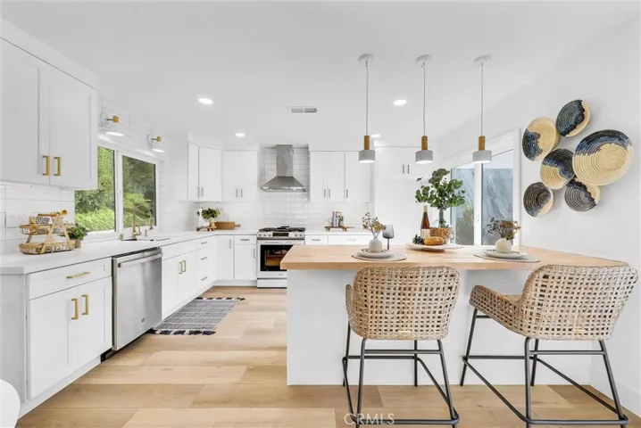 Designer Kitchen featuring natural wood accents