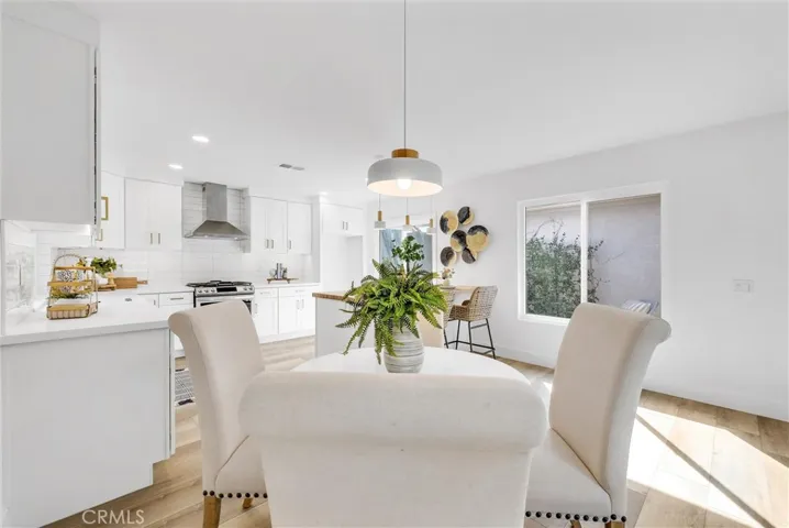 Kitchen opens to dining area