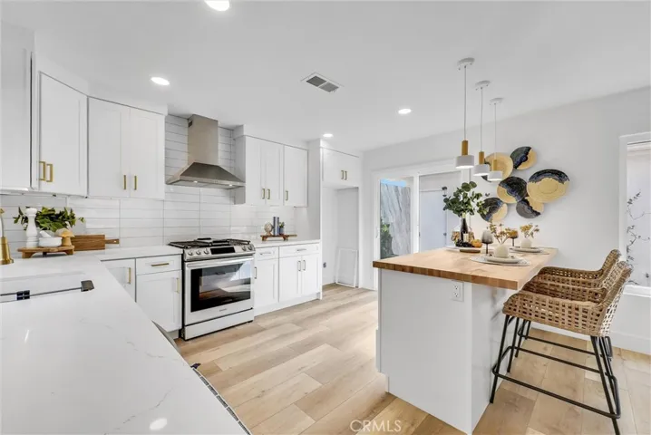 Designer Kitchen with Butcher Block Peninsula