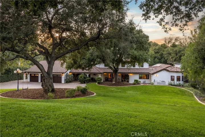 Front elevation through the grass.