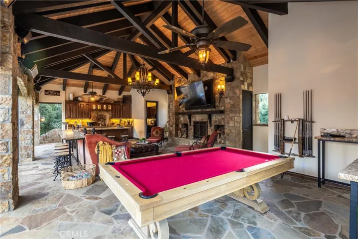 From behind the pool table.