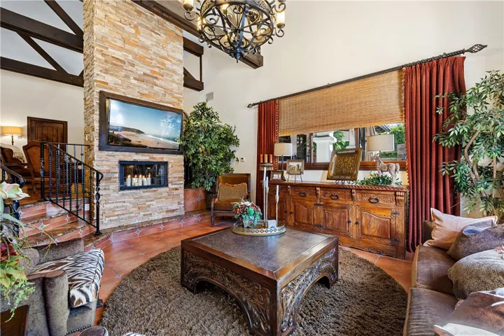 Formal dining room looking toward the fireplace.