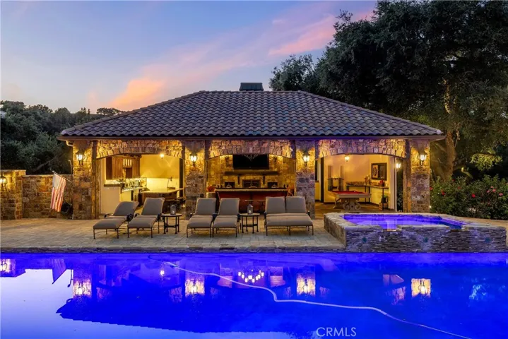 View of the 1,000 sq/ft cabana which has full automatic weather shades on all openings.