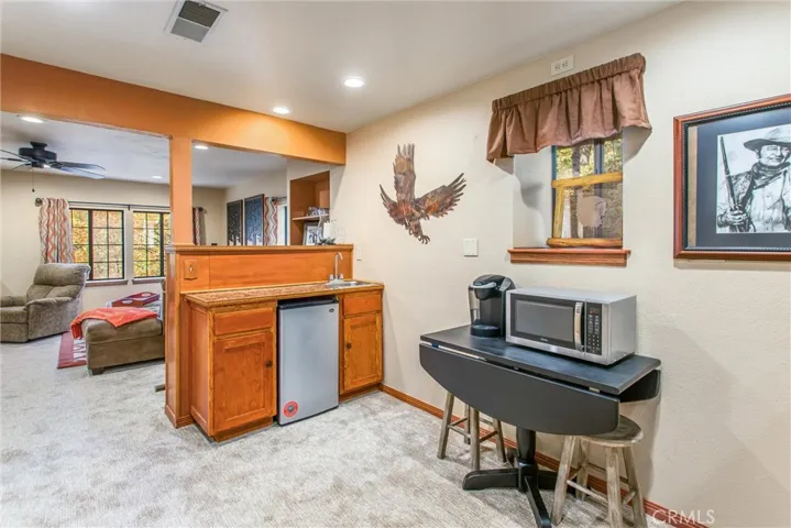 Sink and refrigerator for guests now.