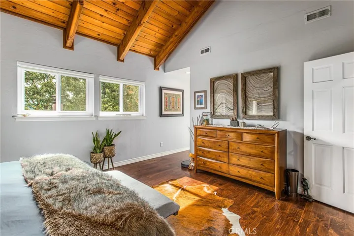 Hallway leads to bath and closets.