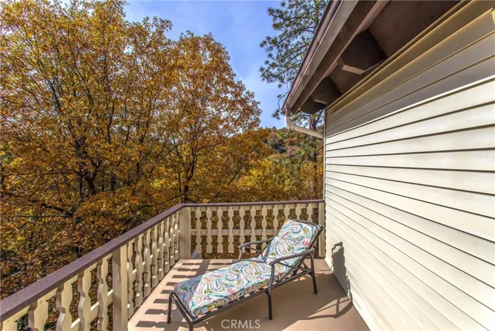 Private deck balcony off Primary bedroom.