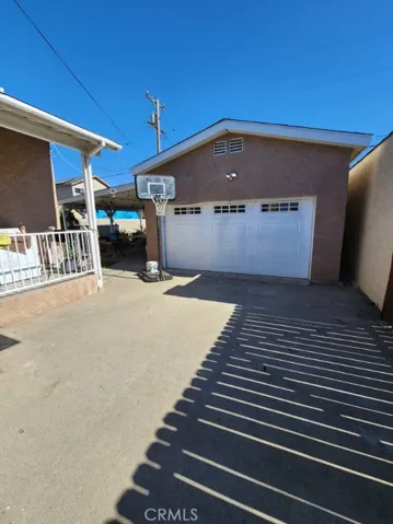 Garage at end of driveway.
