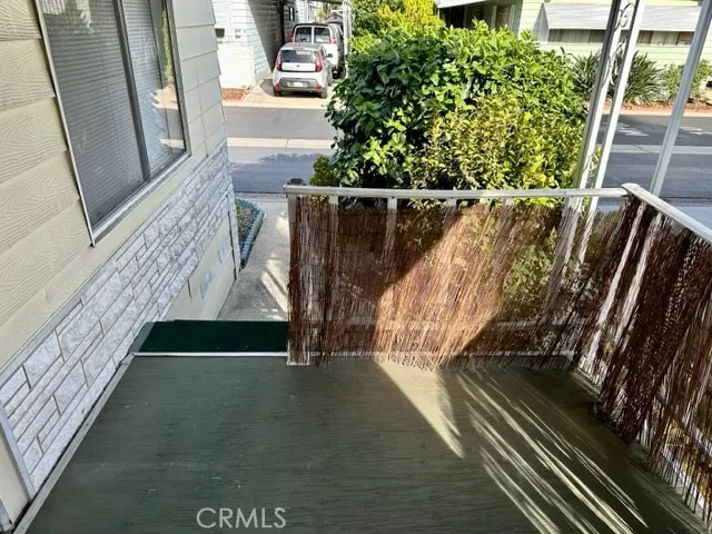 Porch looking to the steps up to the home