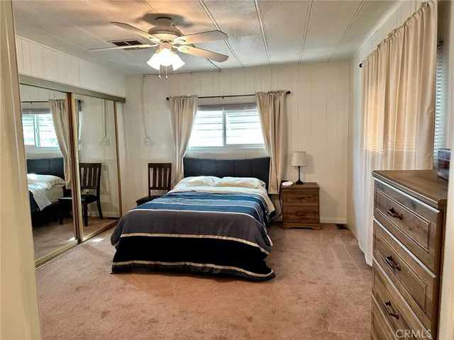 Private master bedroom in the rear of the home.
