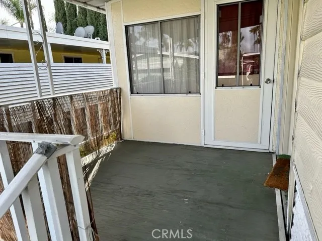 Private front porch.  That door is to the enclosed sunroom