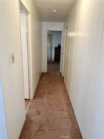 Hallway to the bedrooms.  Fresh, bright paint & carpet is in great shape