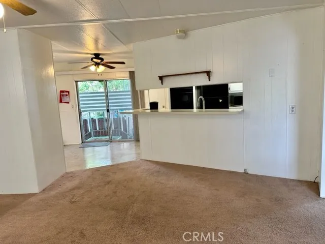 Dining area looking into kitchen