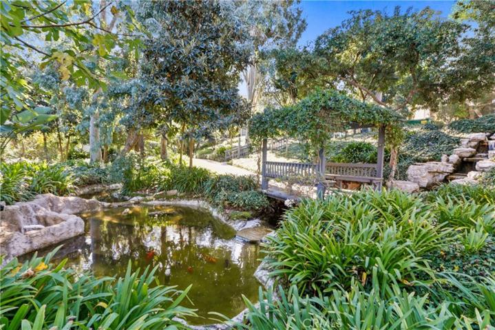 Enjoy a walk in the lush zen grounds with Koi Pod & babbling brooks flowing throughout