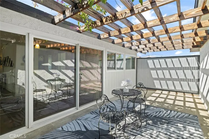 Private covered patio/courtyard in between the garage and main home.