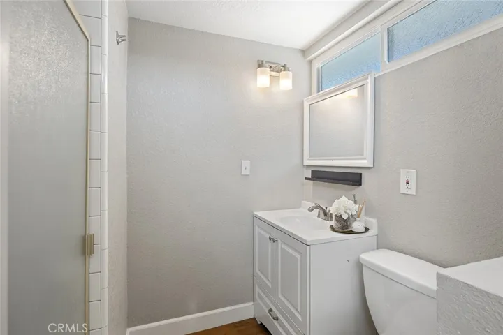 Master bathroom with walk-in shower.