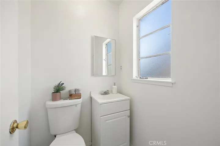View of Master Bathroom, there is a remodeled shower shower behind the door.