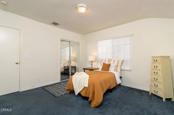 Bdrm #2 with window facing side yard