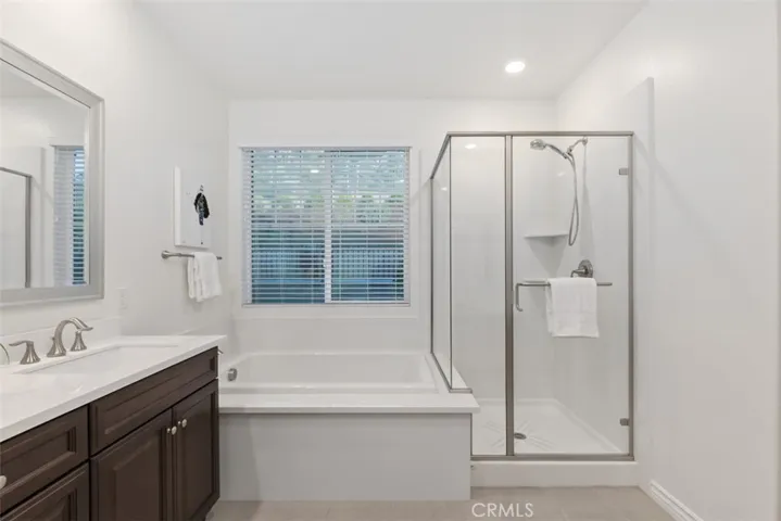 Master Bedroom with soaking tub and shower