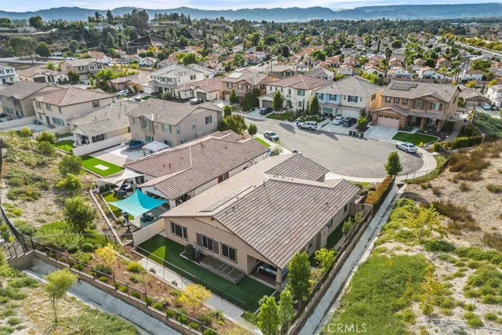 Home is on right side next to hill.