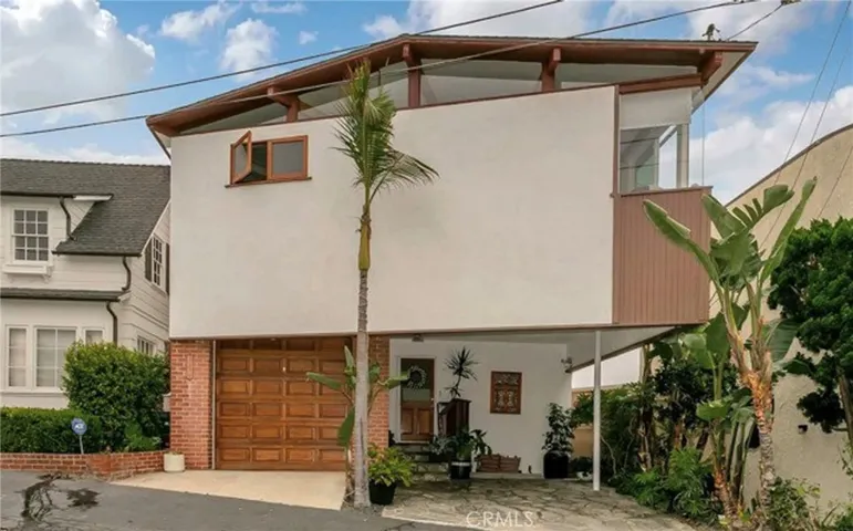 Ocean view home with access to private beach stairs