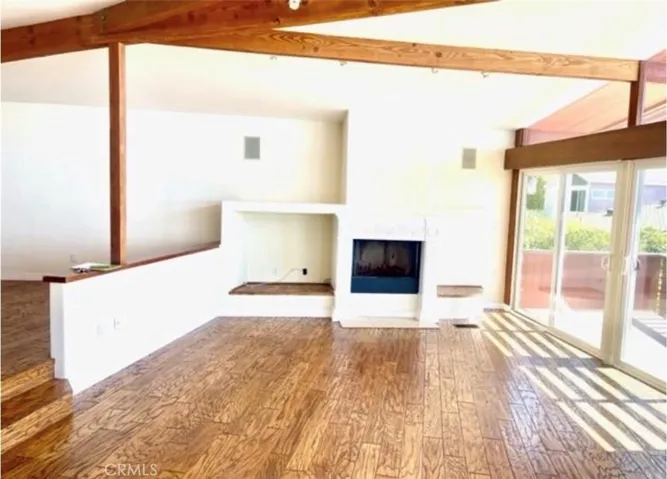 Wood burning fire place in the ocean view living room