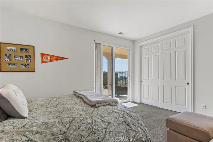 Looking towards ocean sliding glass door leading to patio