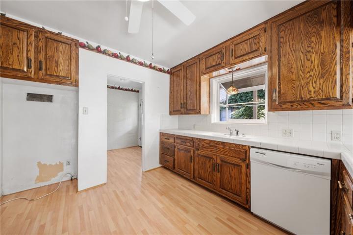 KITCHEN AND ENTRY TO SERVICE PORCH