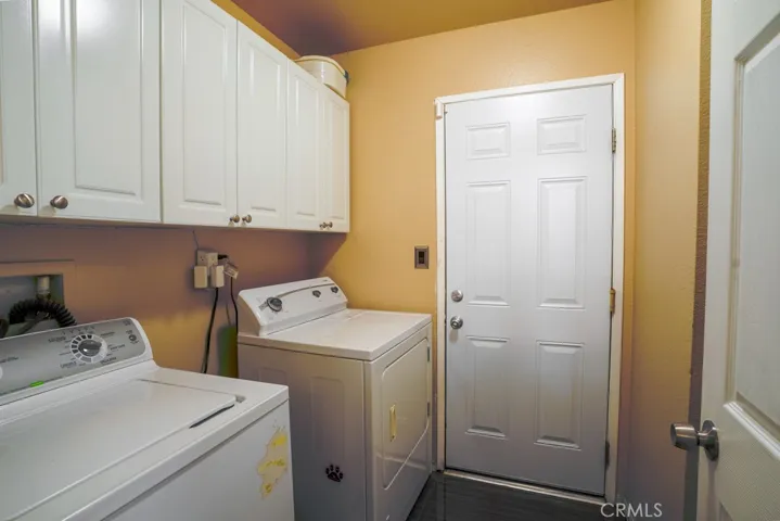 Interior Laundry Room with direct access to the Garage