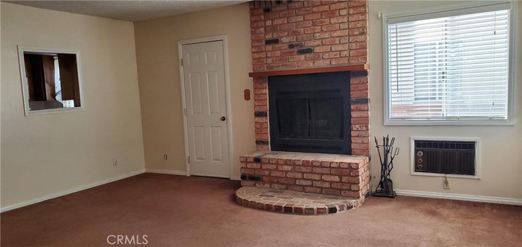 Another view of the Family Room,  beautiful used brick fireplace hearth