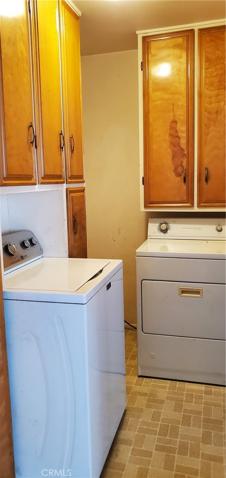 Laundry room off kitchen. Washer and Dryer are included (no warranties)