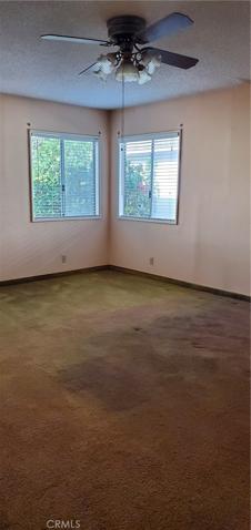 Primary Bedroom has ceiling fan