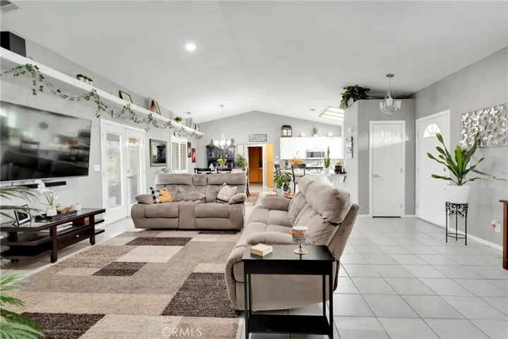 Open floor plan with neutral paint, crisp white trim and casements, remodeled kitchen and luxe custom upgrades throughout.