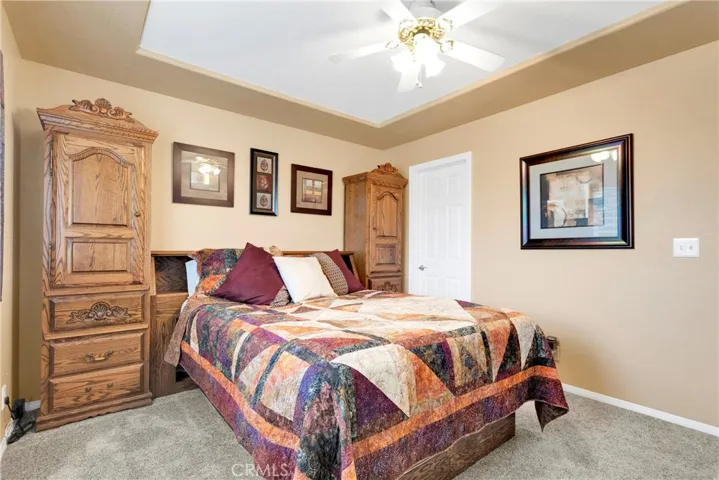 Hall bedroom with walk-in closet.