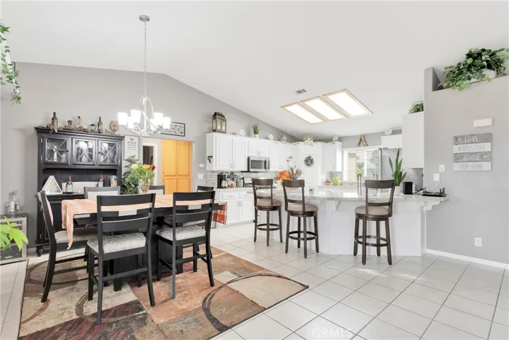 Open floor plan ideal for entertaining. Kitchen has plenty of room for storage and meal prep, and a few cooks!