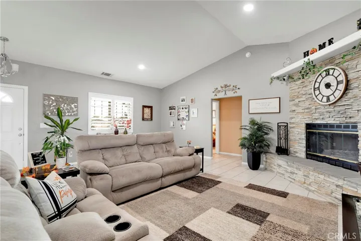 Corner dry stack stone fireplace, tile floors in the main area. Carpet in the bedrooms is only four years old.
