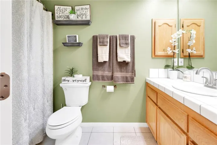 Hall bathroom is spacious and features a tub/shower combo.