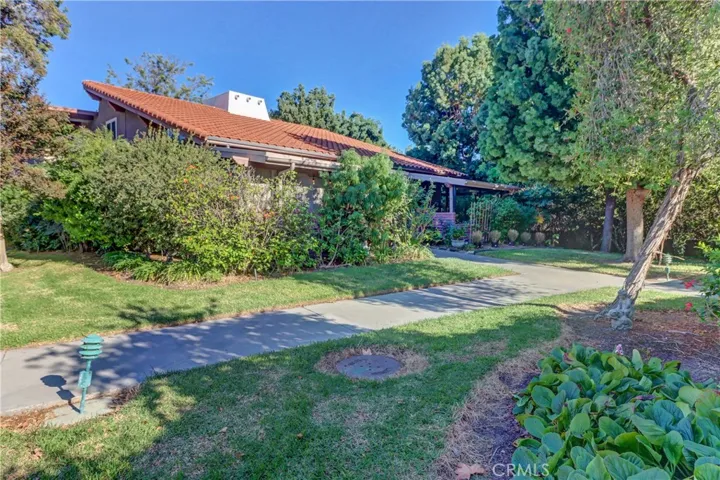 SIDEWALK FROM CARPORT TO UNIT A ON RIGHT