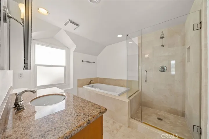 Primary Bath with Jacuzzi tub and shower